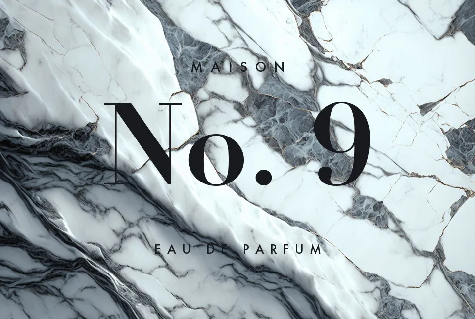Perfume branding on white marble, erased with the veining intact